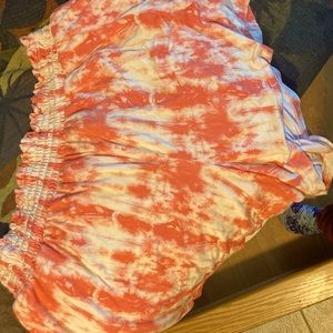 Short flowy shorts with a spandex waist. Never worn. Smoke Free home